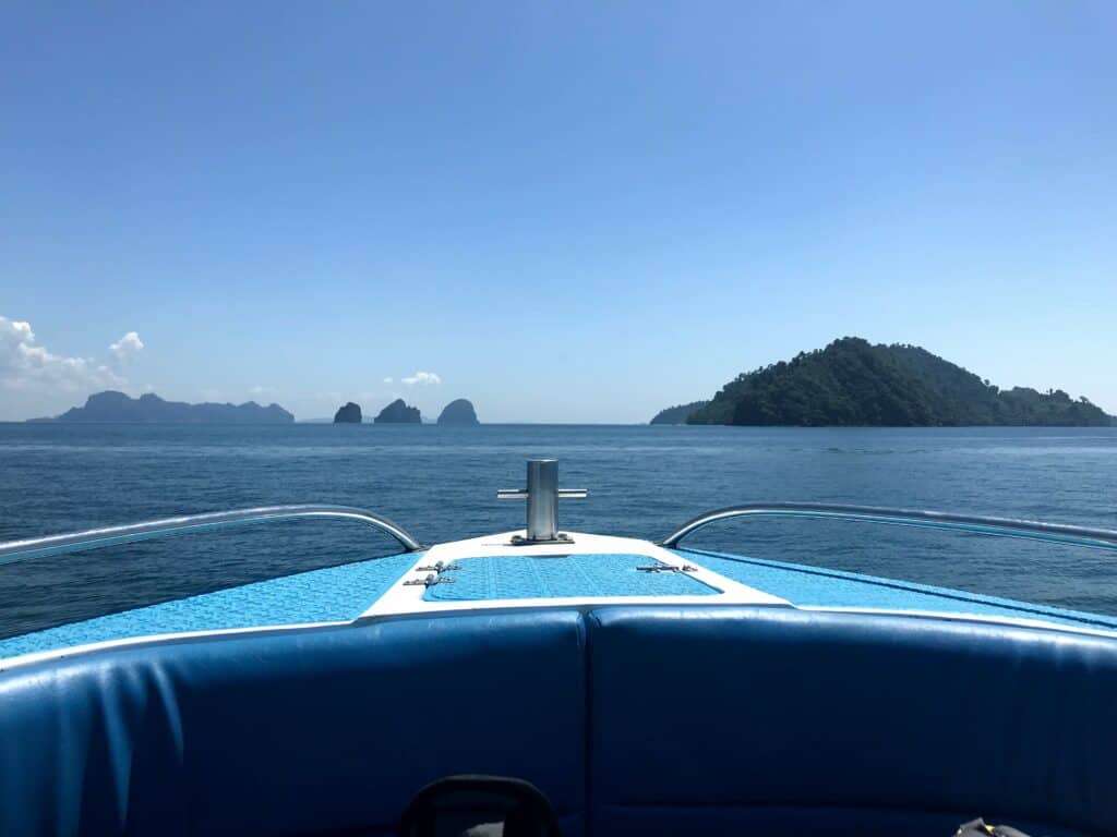 View from the front of a speedboat travelling passed islands from Phuket to Krabi