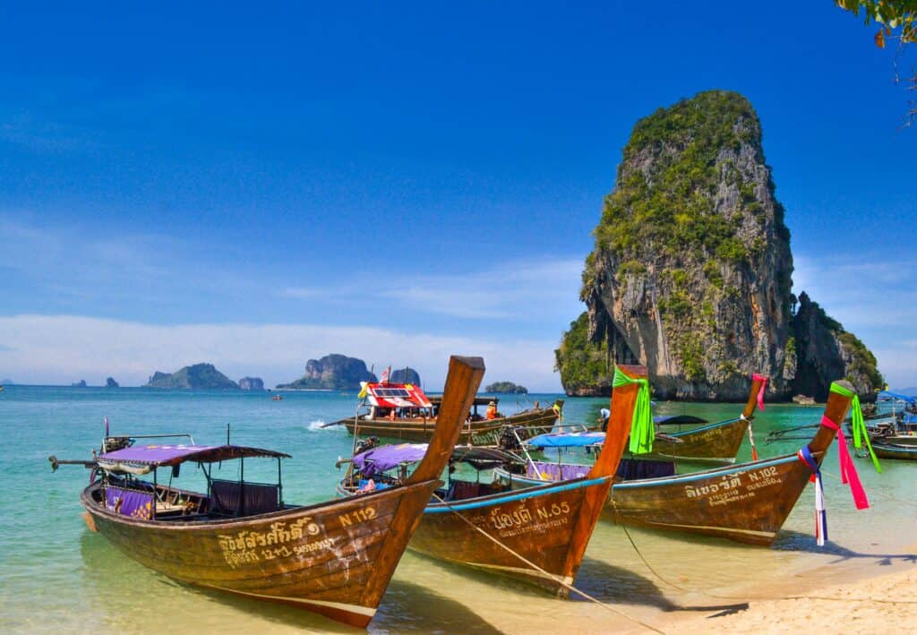 Longtail boats on the beach at Railay.