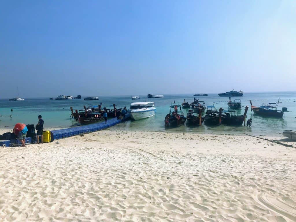 Speedboat and longtail boat on the beach in Koh Lipe