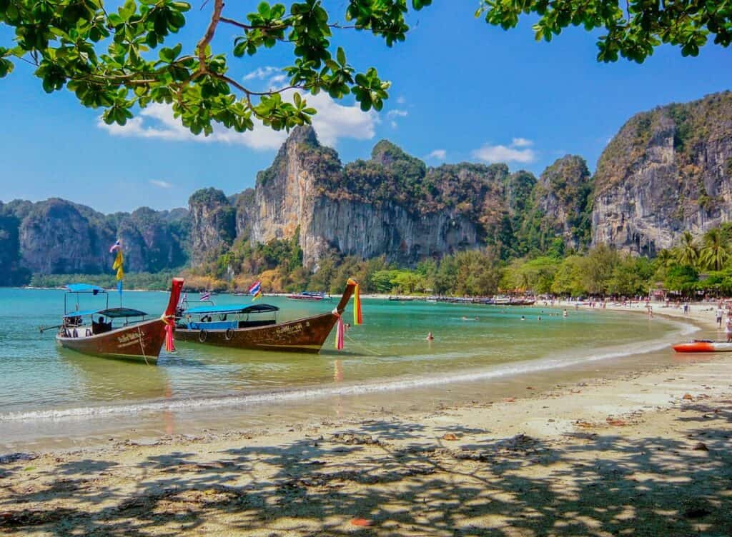 2 longtail boats at Railay Beach, of of the places to go in Krabi with Kids 