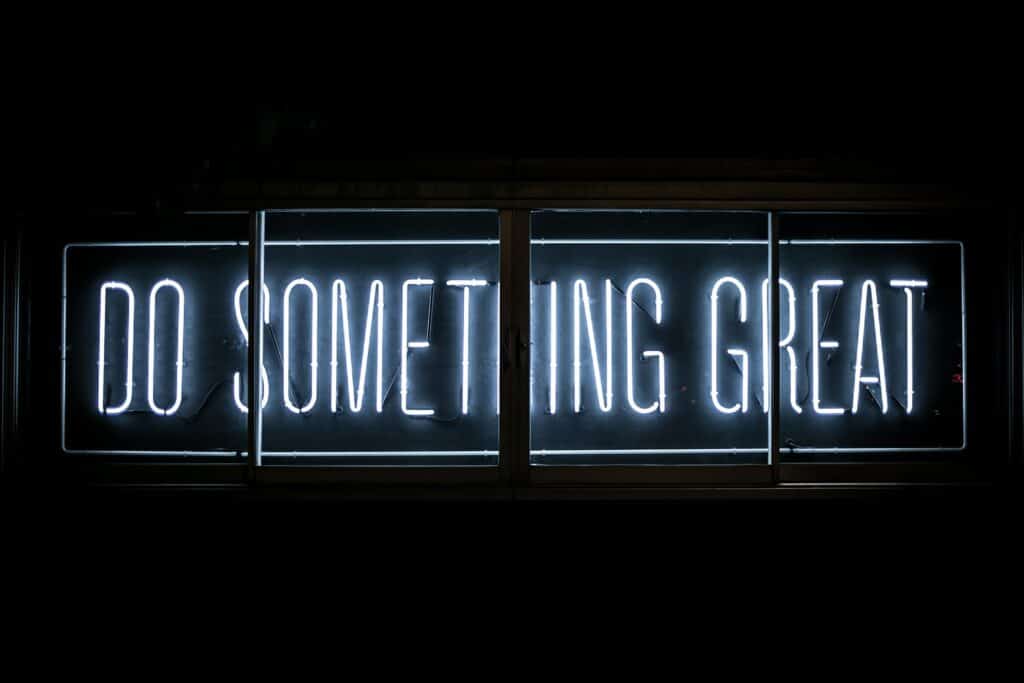 Neon sign saying Do Something Great