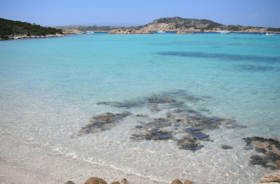turquoise waters with island behind