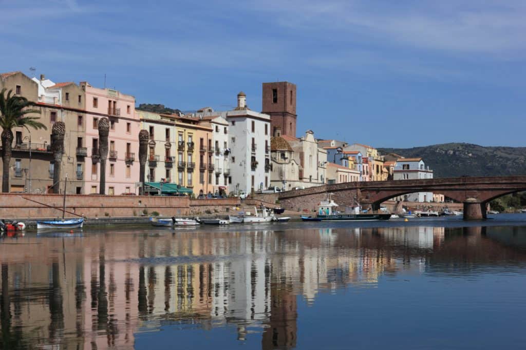 Image of the riverfront at Bosa. Visiting this town is one of the best things to do in Alghero