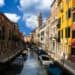 Venice side canal and colourful buildings. How many days in Venice is enough?