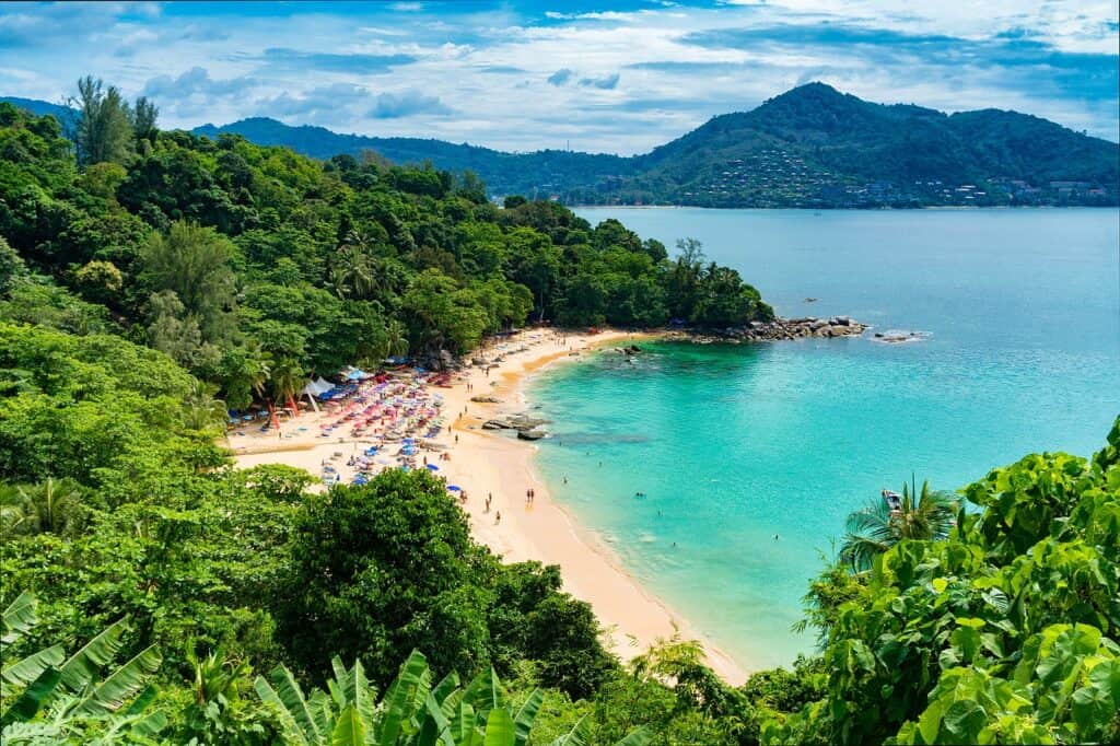 Aerial shot of beach and blue seas. One of th ebest places to visit in Phuket with Kids