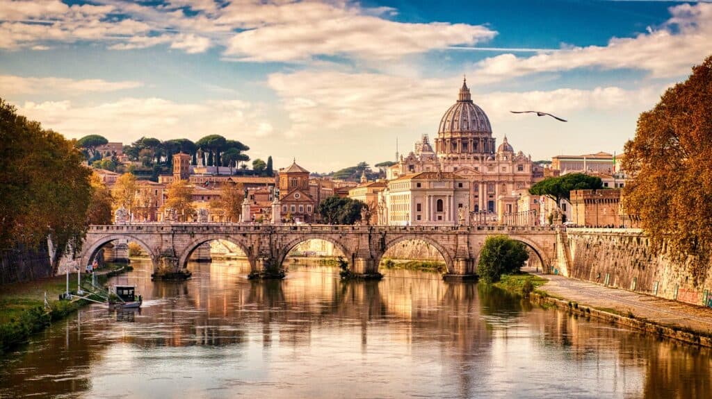 The Vatican seen beyond the tiber river on the first day of our 10 day Italy itinerary